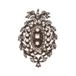 A diamond brooch pendant