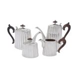 An Italian silver coloured oval fluted four piece tea set