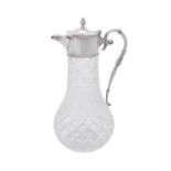 A silver mounted cut glass baluster claret jug by Israel Freeman & Son Ltd.