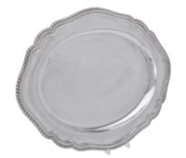 A silver shaped oval tray by C. J. Vander Ltd.