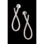 A pair of diamond scroll earrings