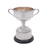 A silver twin handled pedestal trophy cup by Thomas Fattorini
