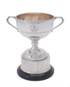 A silver twin handled pedestal trophy cup by Thomas Fattorini