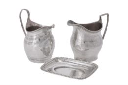 A George III silver baluster cream jug by John Merry