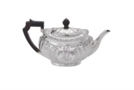 A Victorian silver oval tea pot by Atkin Brothers