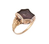An early 19th century amethyst intaglio ring