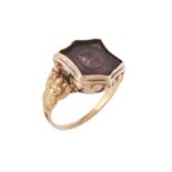 An early 19th century amethyst intaglio ring