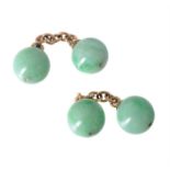 A pair of early 20th century jadeite and diamond accented cufflinks
