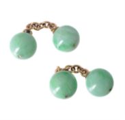 A pair of early 20th century jadeite and diamond accented cufflinks