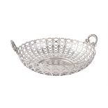 An Edwardian silver twin handled circular basket