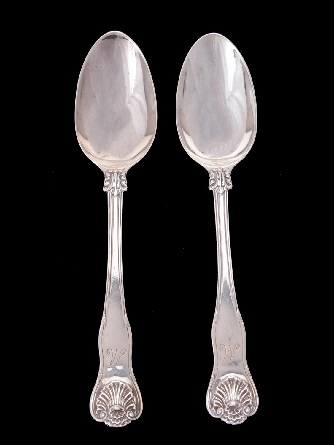 A pair of Victorian silver shell pattern serving spoons by Chawner & Co.