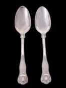 A pair of Victorian silver shell pattern serving spoons by Chawner & Co.