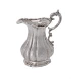 A Victorian silver lobed baluster cream jug