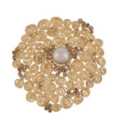 A brown diamond and South Sea pearl spiral brooch by Urart