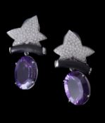 Y A pair of amethyst, ebony and diamond earrings
