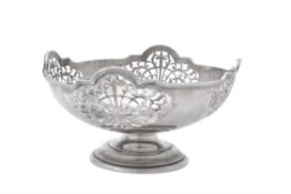 A silver shaped circular pedestal bowl by Northern Goldsmiths Co.