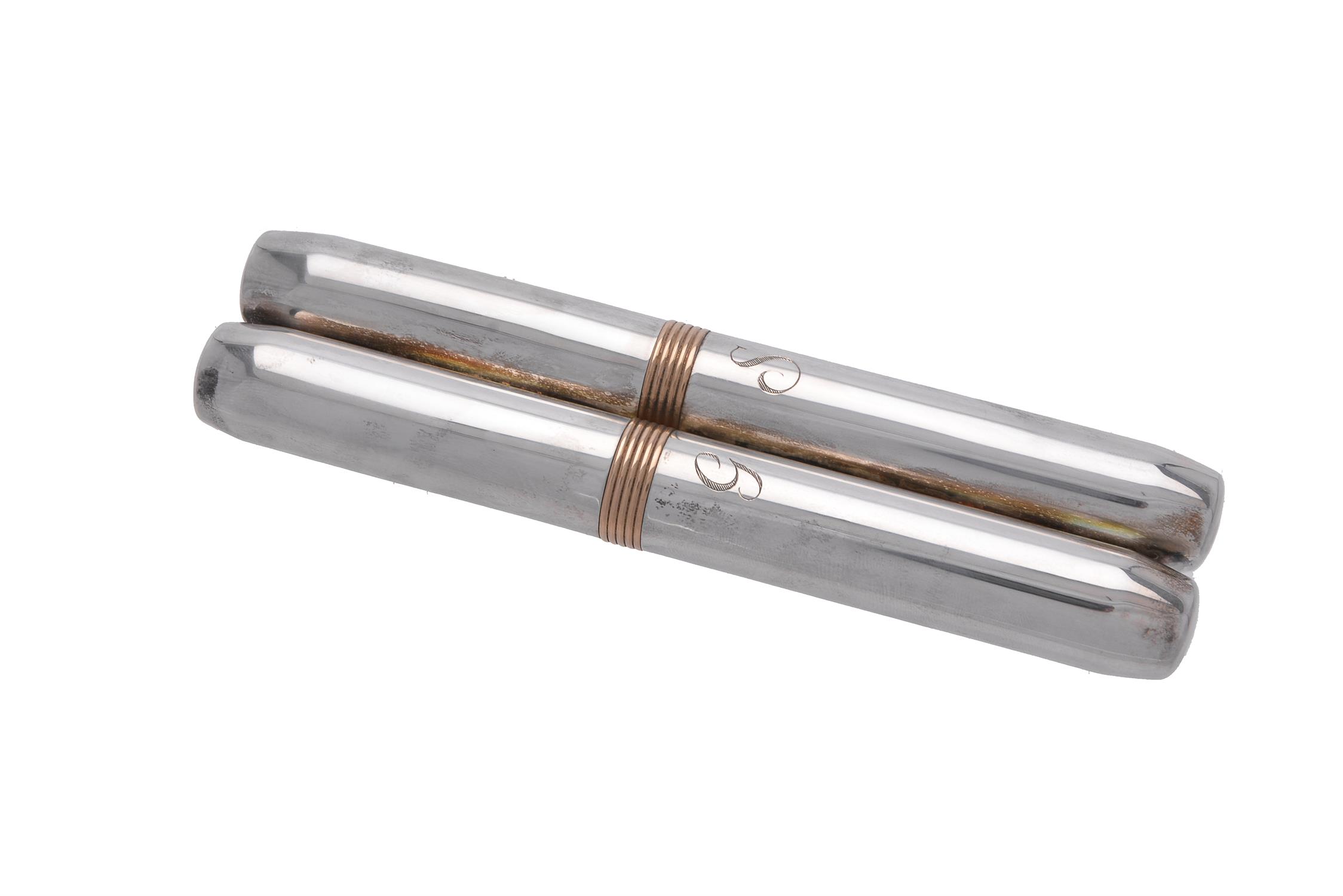 A silver coloured double cigar holder by Tiffany & Co.