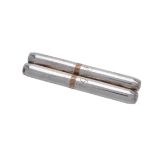 A silver coloured double cigar holder by Tiffany & Co.