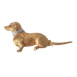 A 1960s diamond and ruby dachshund brooch