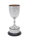 An Edwardian silver pedestal trophy cup by Walker & Hall