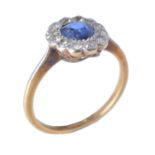 An early 20th century sapphire and diamond cluster ring