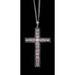 An early 20th century diamond set cross pendant