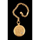 A gold coloured fob