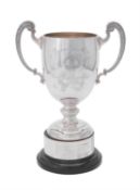 A silver twin handled pedestal trophy cup by Mappin & Webb