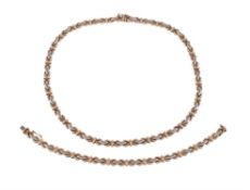 A two colour necklace and bracelet