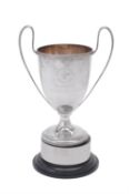 A silver twin handled pedestal trophy cup by Jay, Richard Attenborough Co. Ltd.