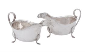 A pair of oval sauce boats by Barker Brothers Silver Ltd.