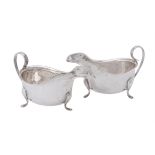 A pair of oval sauce boats by Barker Brothers Silver Ltd.