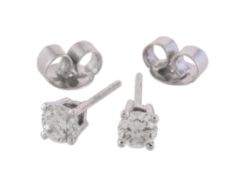 A pair of diamond ear studs