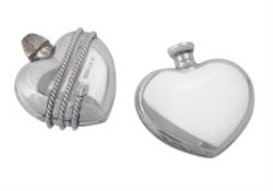 A silver coloured heart shaped scent bottle by Tiffany & Co.