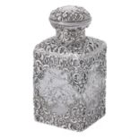 A late Victorian silver mounted cut glass bottle by Goldsmiths & Silversmiths Co. Ltd.