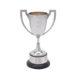 A silver twin handled pedestal trophy cup by Mappin & Webb