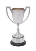 A silver twin handled pedestal trophy cup by Mappin & Webb