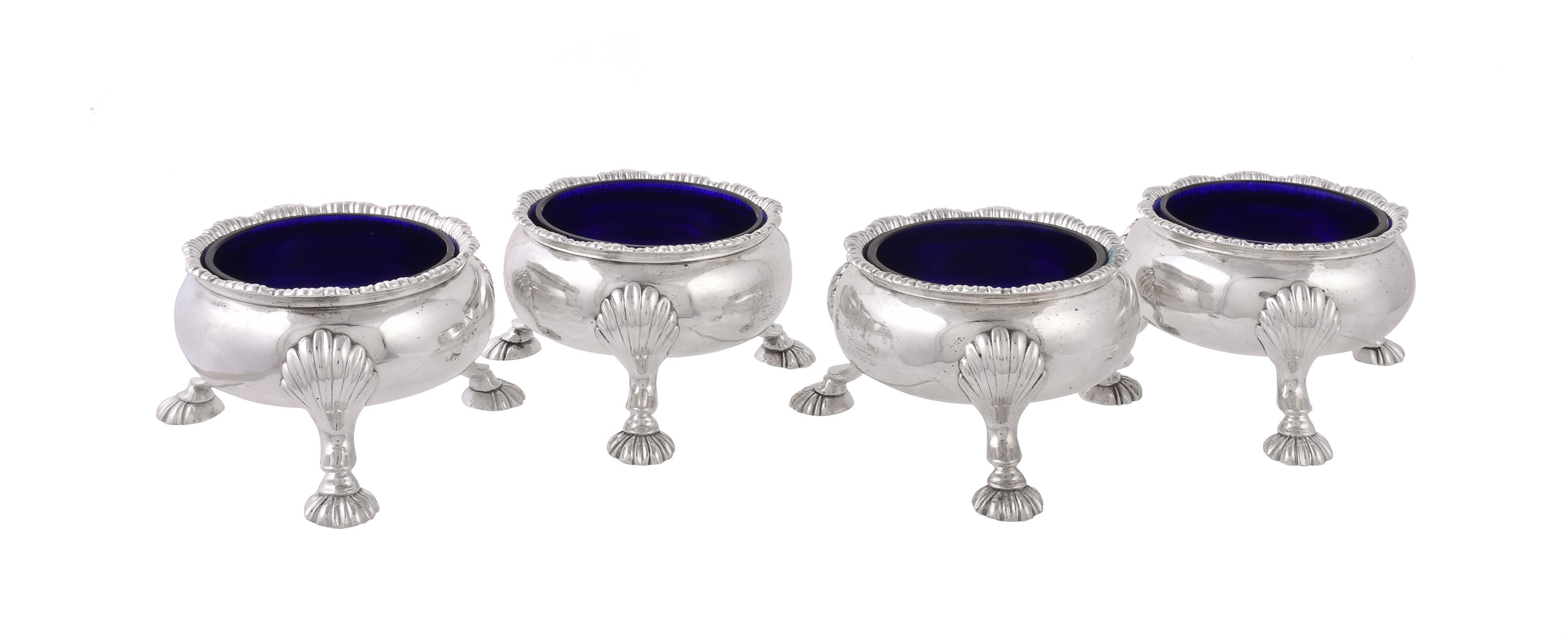 A set of four late George II silver cauldron salt cellars by David Hennell I