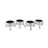 A set of four late George II silver cauldron salt cellars by David Hennell I