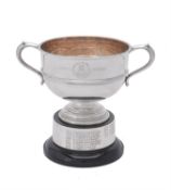 A silver twin handled pedestal cup