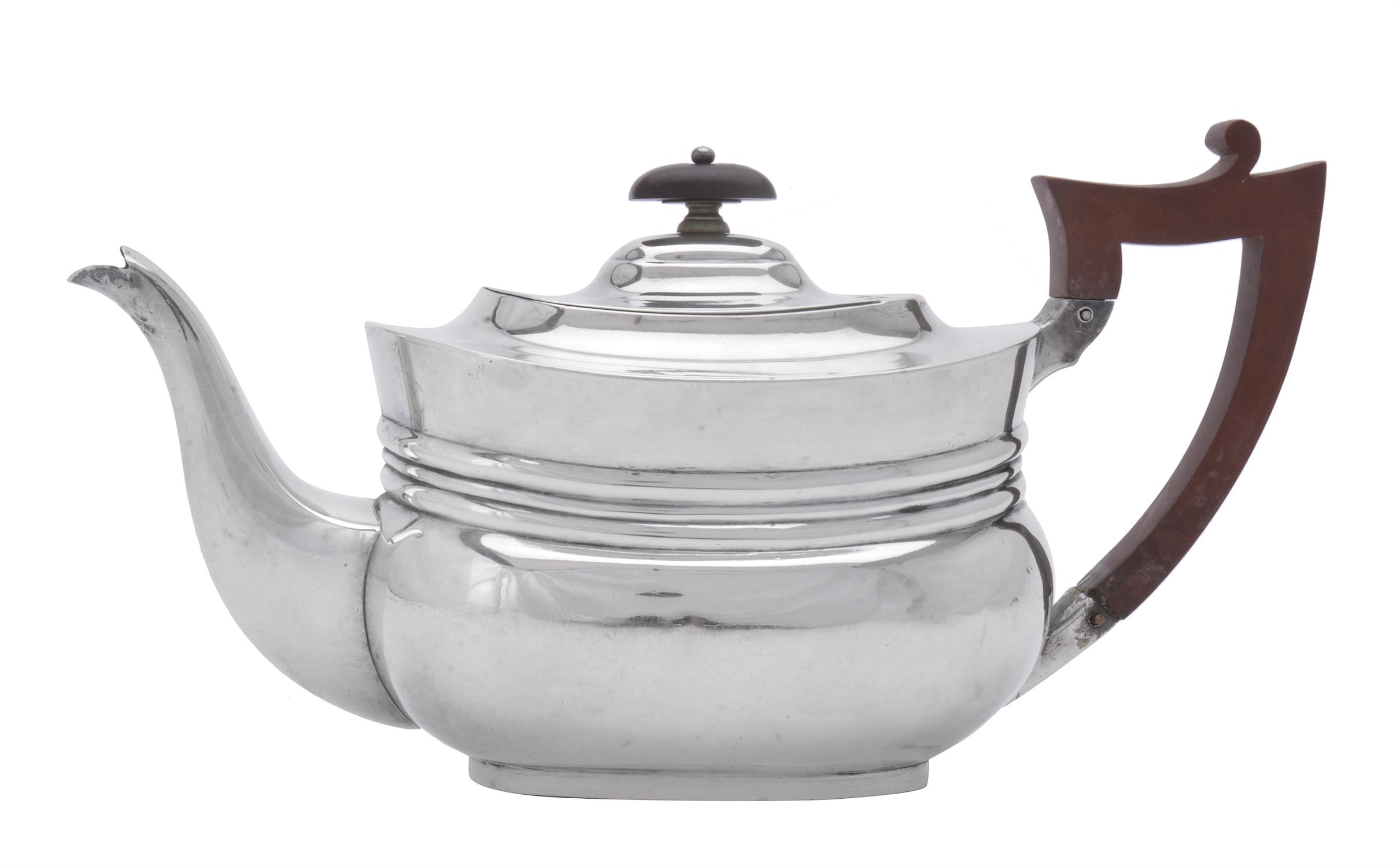 A late Victorian silver oblong baluster tea pot by Edward Barnard & Sons Ltd.