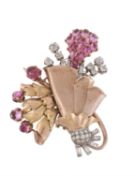 A 1950s pink sapphire and diamond floral spray brooch