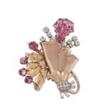 A 1950s pink sapphire and diamond floral spray brooch