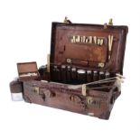 Y Asprey, a brown crocodile travel case