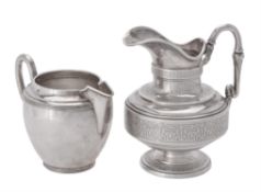 A Dutch silver coloured cream jug