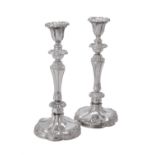 A pair of silver candlesticks by Mappin & Webb