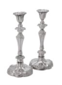 A pair of silver candlesticks by Mappin & Webb