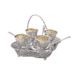 A Victorian silver quatrefoil four cup egg stand by Henry Wilkinson & Co.