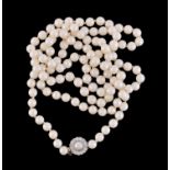 An opera length cultured pearl necklace with diamond and pearl clasp
