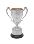 A silver twin handled baluster vase shaped trophy cup by Bravingtons Ltd.